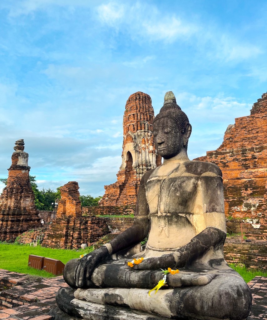 A sitting Buddha statue in the ancient city of Ayuttaha